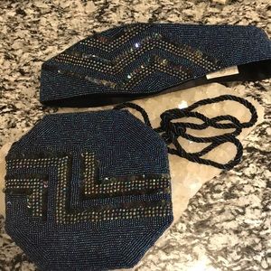 Beaded mini cocktail bag with matching belt.